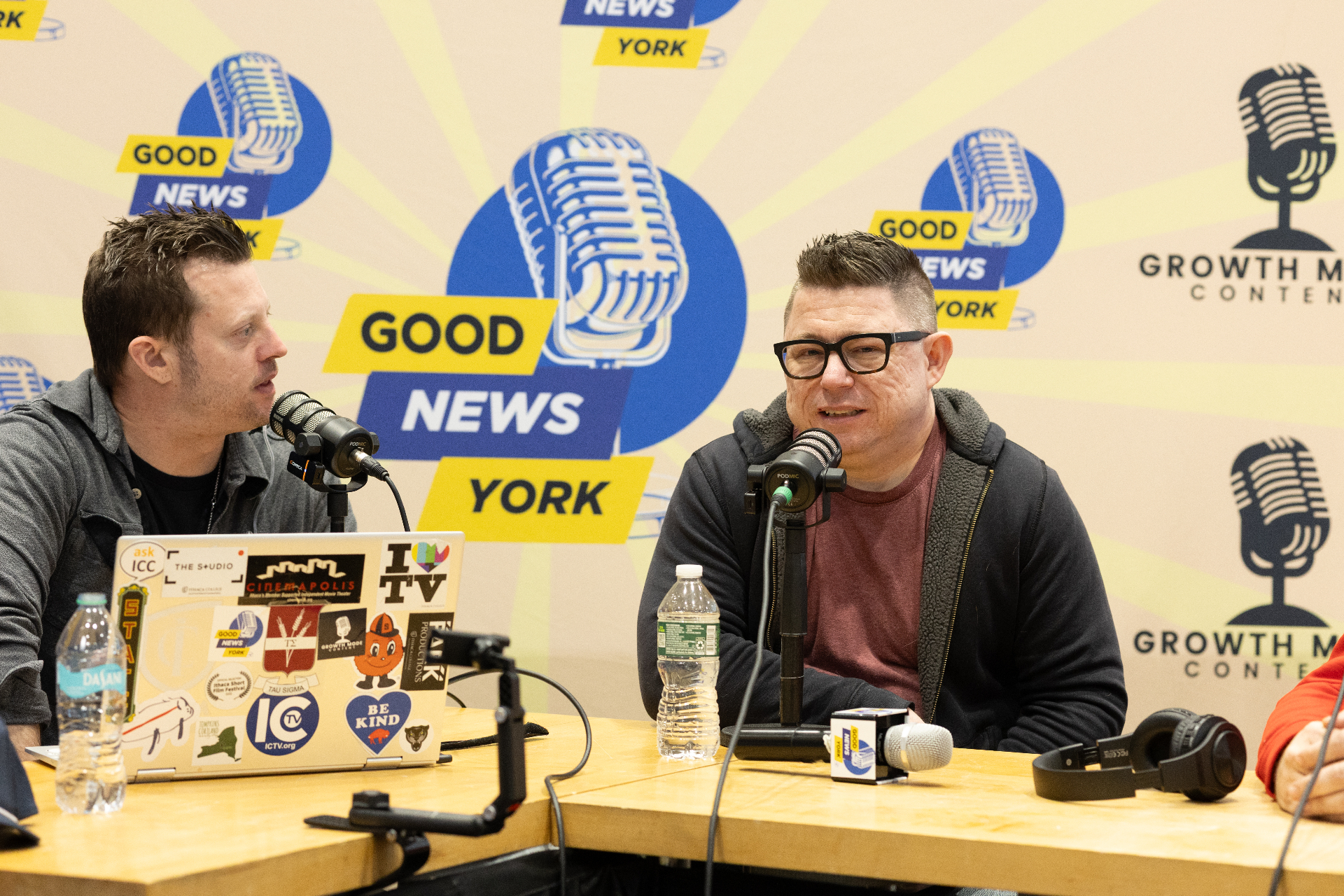 Podcast hosts recording at Click Stream Studios