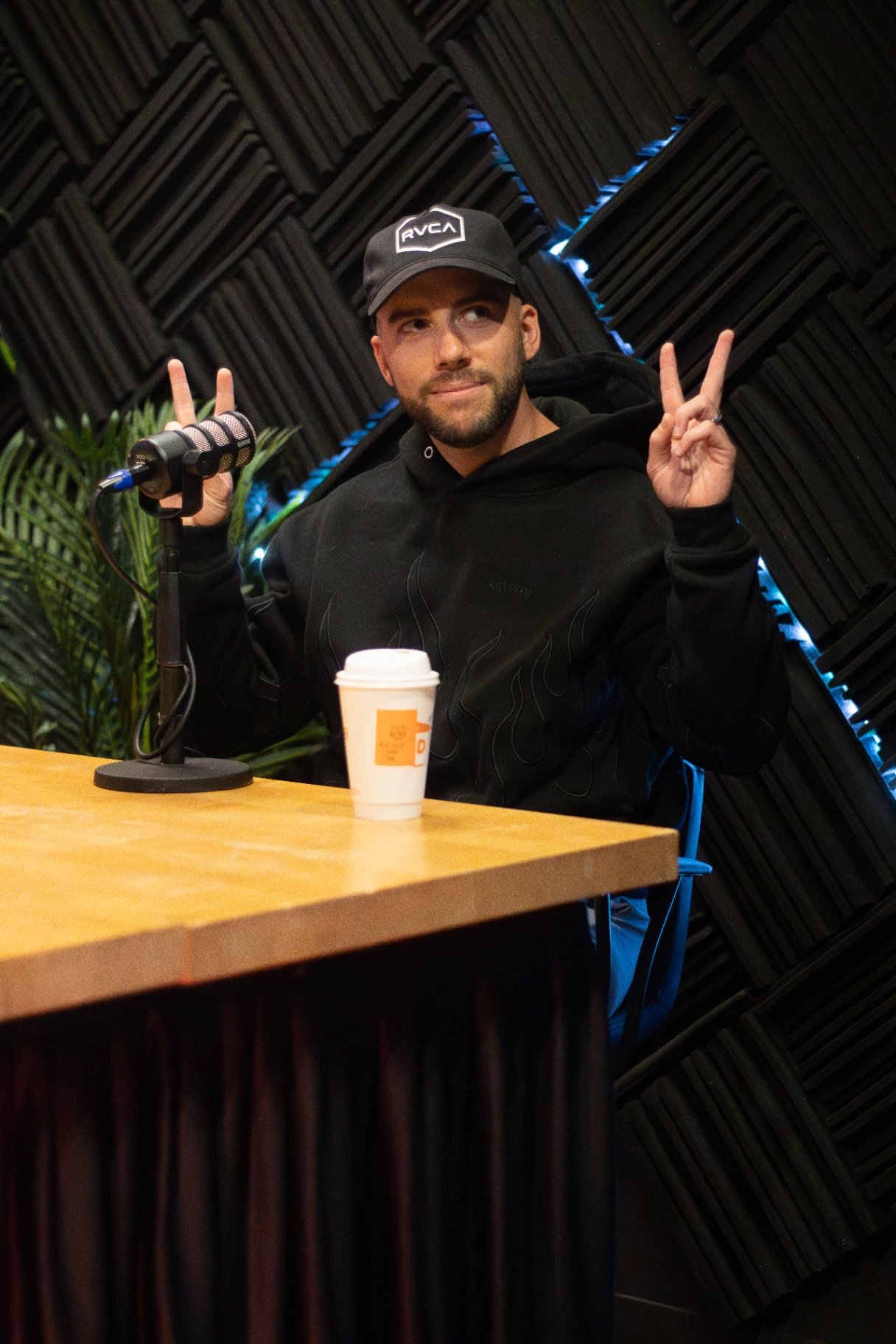 Creator filming a podcast episode